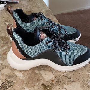 A unique pair of Sam Edelman Gym or Dress Sneakers